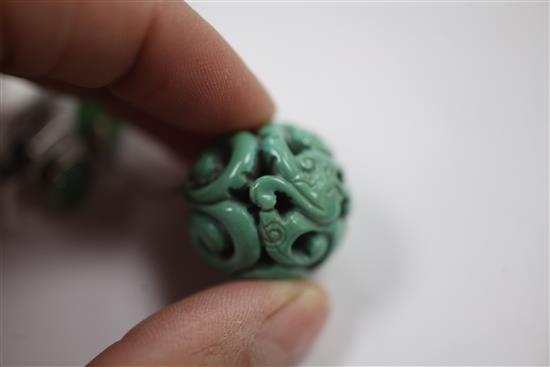 A Chinese turquoise bead, late 19th / early 20th century, 4.7cm